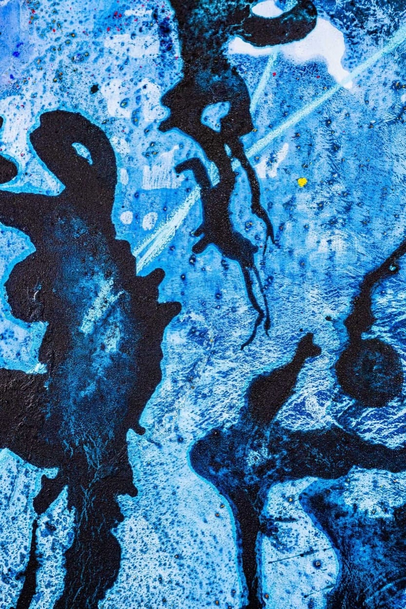 Detail of a painting by Annina Roescheisen, black shapes over layered blues