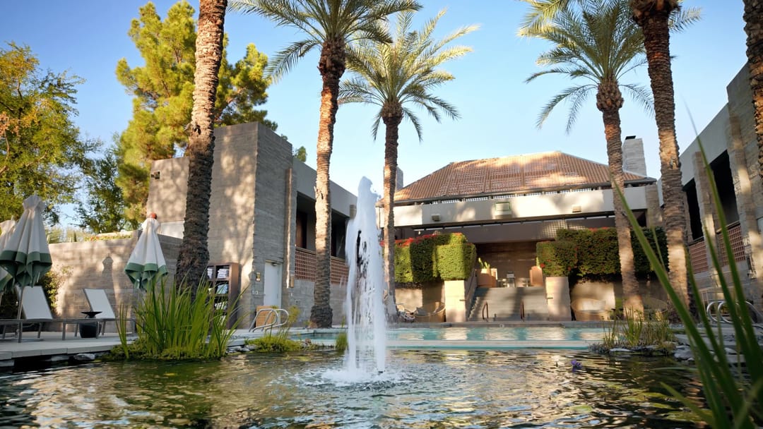 Fountain in the spa garden among palms, from the Grand Hyatt Scottsdale spa film