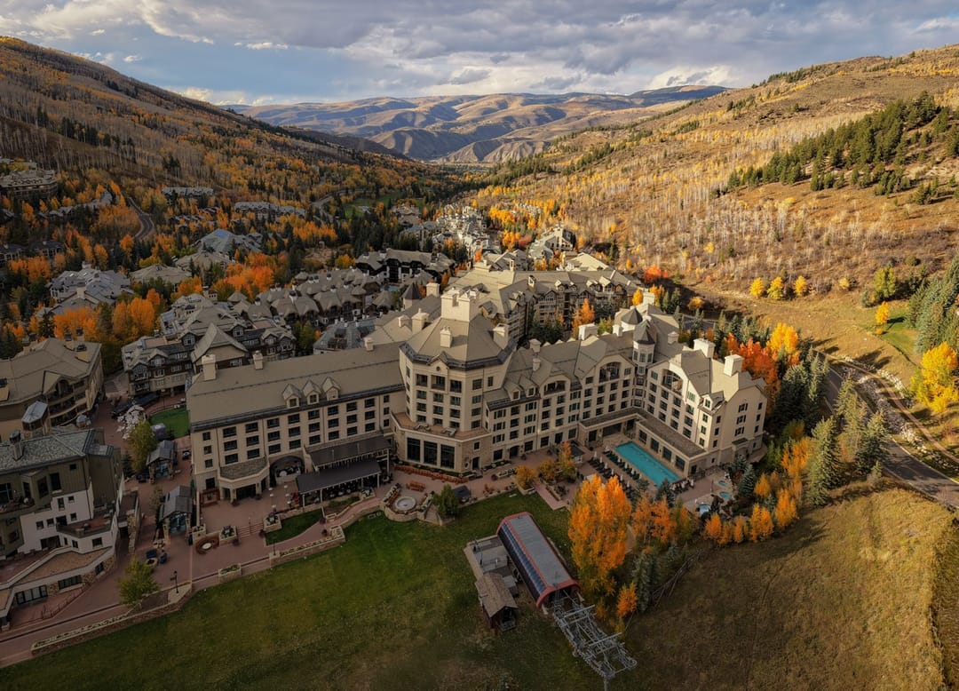 Park Hyatt Beaver Creek from above, fall color down the valley
